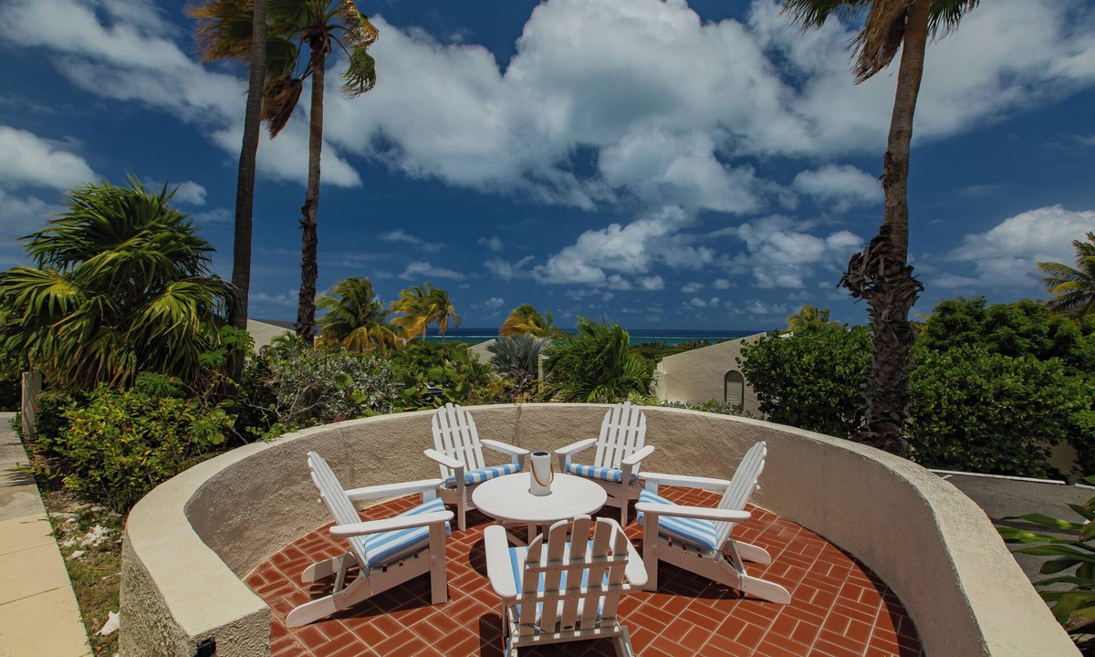 Teagues Bay Condo | East End Villa Located on Golf Course - Hilltop Pool