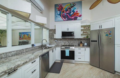 Teagues Bay Condo | East End Villa Located on Golf Course - Hilltop Pool