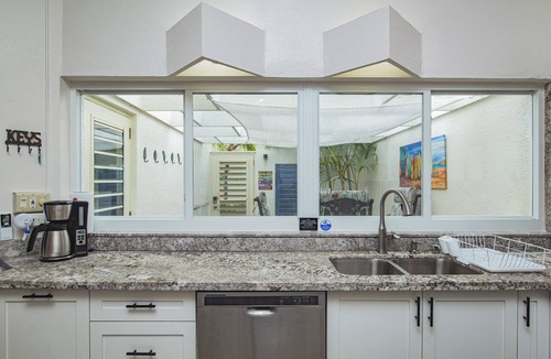 Teagues Bay Condo | East End Villa Located on Golf Course - Hilltop Pool