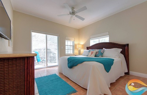 Estate Enighed Condo | Grande Bay Waterfront Condo