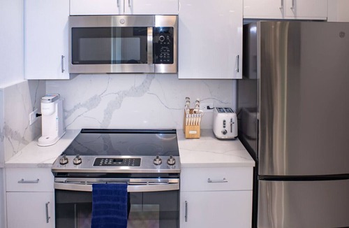 Estate Enighed Apartment | Raintree Suites - Steps to the Beach